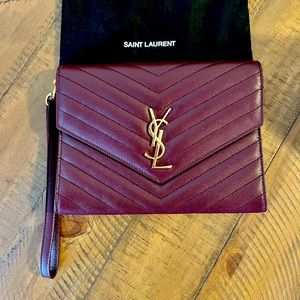 Saint Laurent monogram clutch in quilted grain de poundre embossed leather